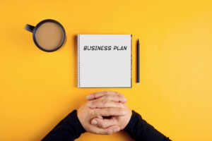 person sitting in front of a business plan